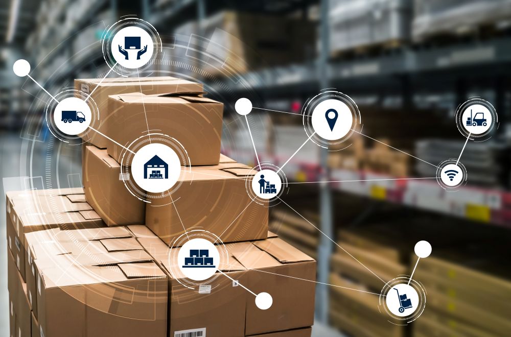 Boxes in a warehouse showing how warehouse management software works to connect processes throughout the operation.