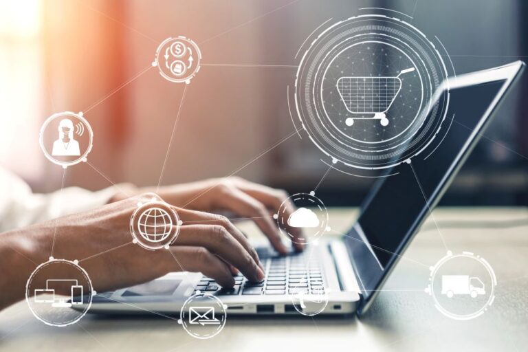 ecommerce icons overlayed on a laptop showing PowerHouse WMS native integration to leading ecommerce platforms.